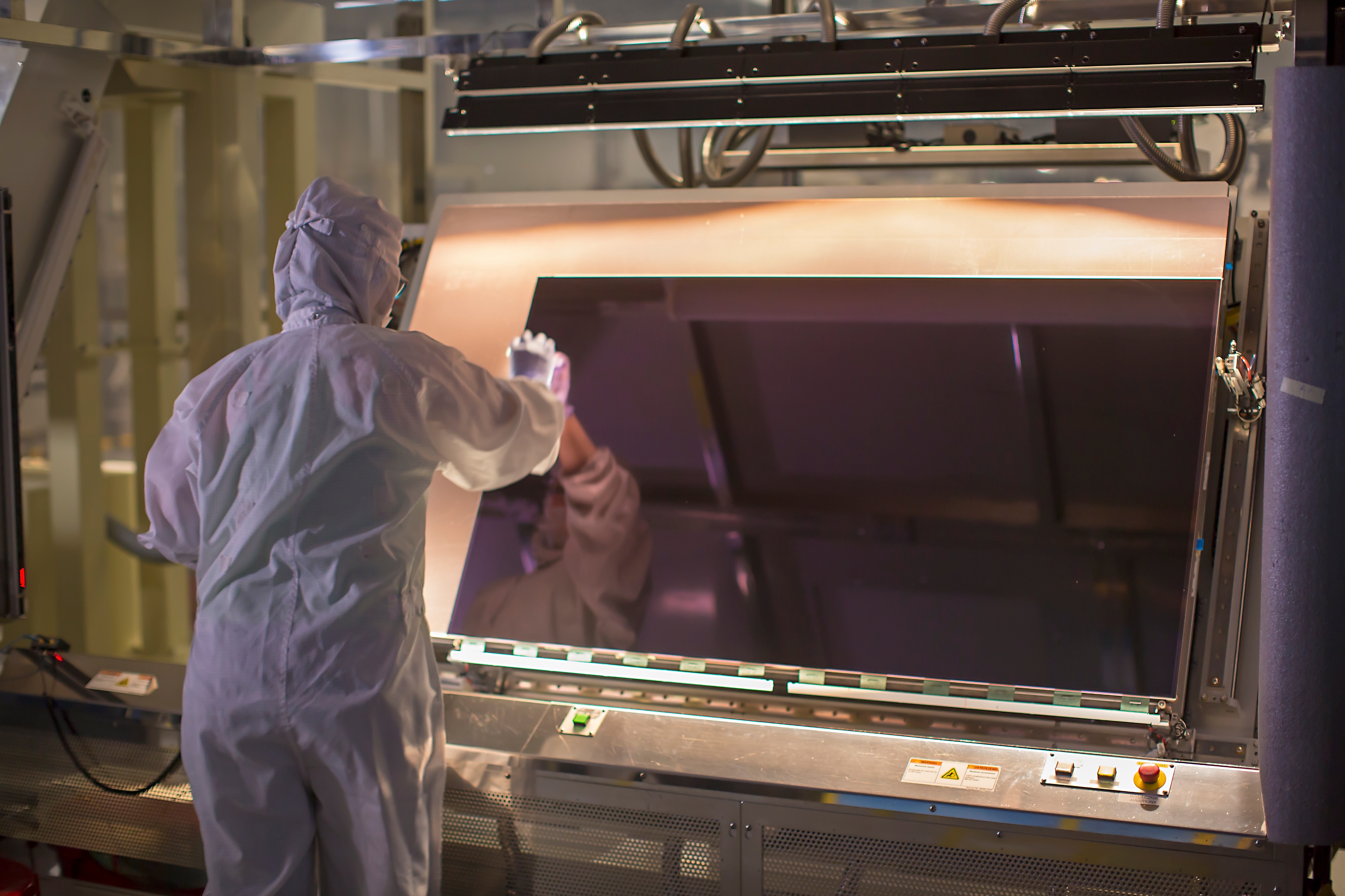 Engineer working on display panel